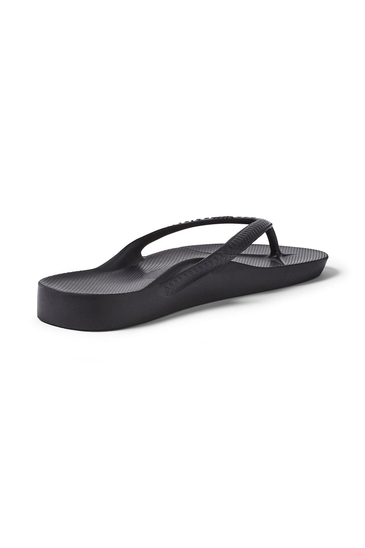 Archies Arch Support Flip Flops Black, angled side view showing the arch