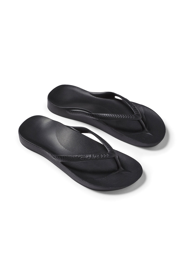 Archies Arch Support Flip Flops Black, pair at an angle