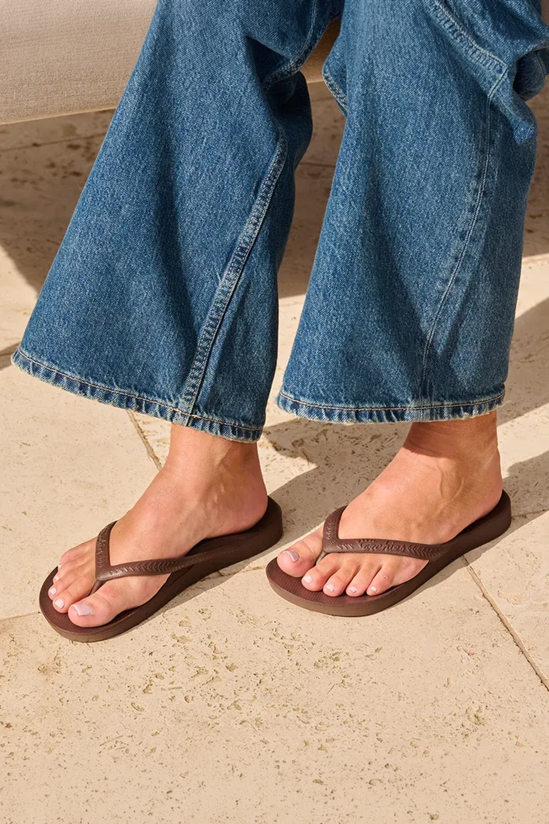 Archies arch support flip flops in brown at Shirley Allum