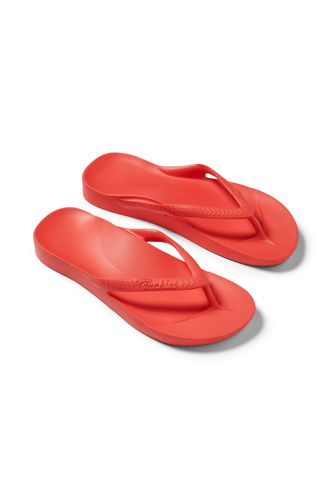 Archies Arch Support Flip Flops Coral, pair at an angle