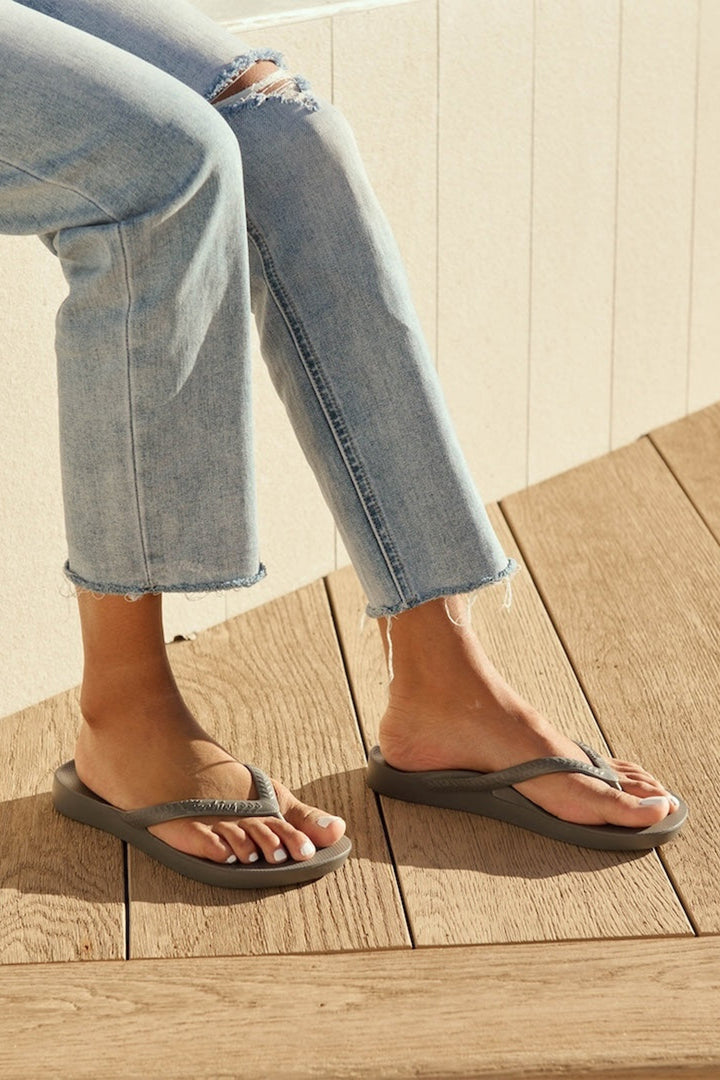 Archies Arch Support Flip Flops Grey, on foot close up