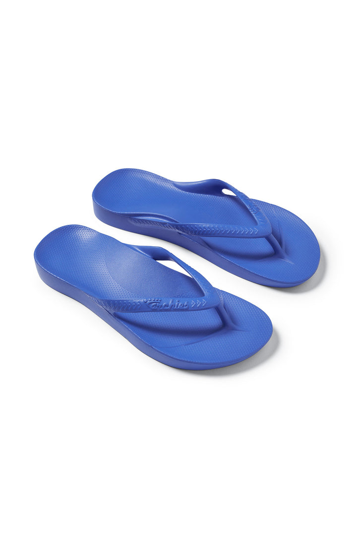 Archies Arch Support Flip Flops Royal Blue, pair at an angle