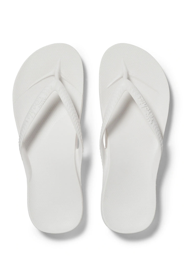 Archies arch support flip flops in white at Shirley Allum