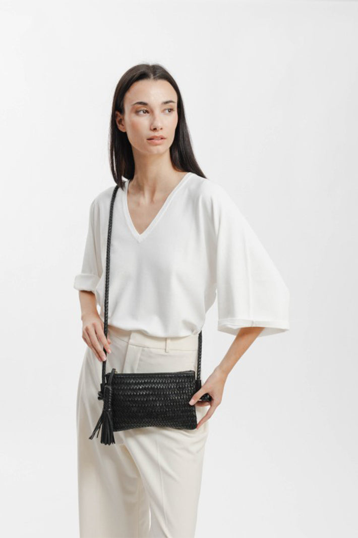 Biba Perkins Black Woven Leather Cross Body Bag PER15L, worn cross body, three-quarter