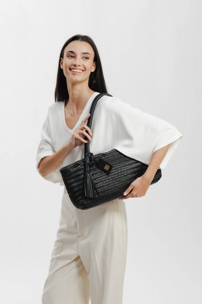 Biba Perkins Black Woven Leather Shoulder Bag PER10L, carried in the hand