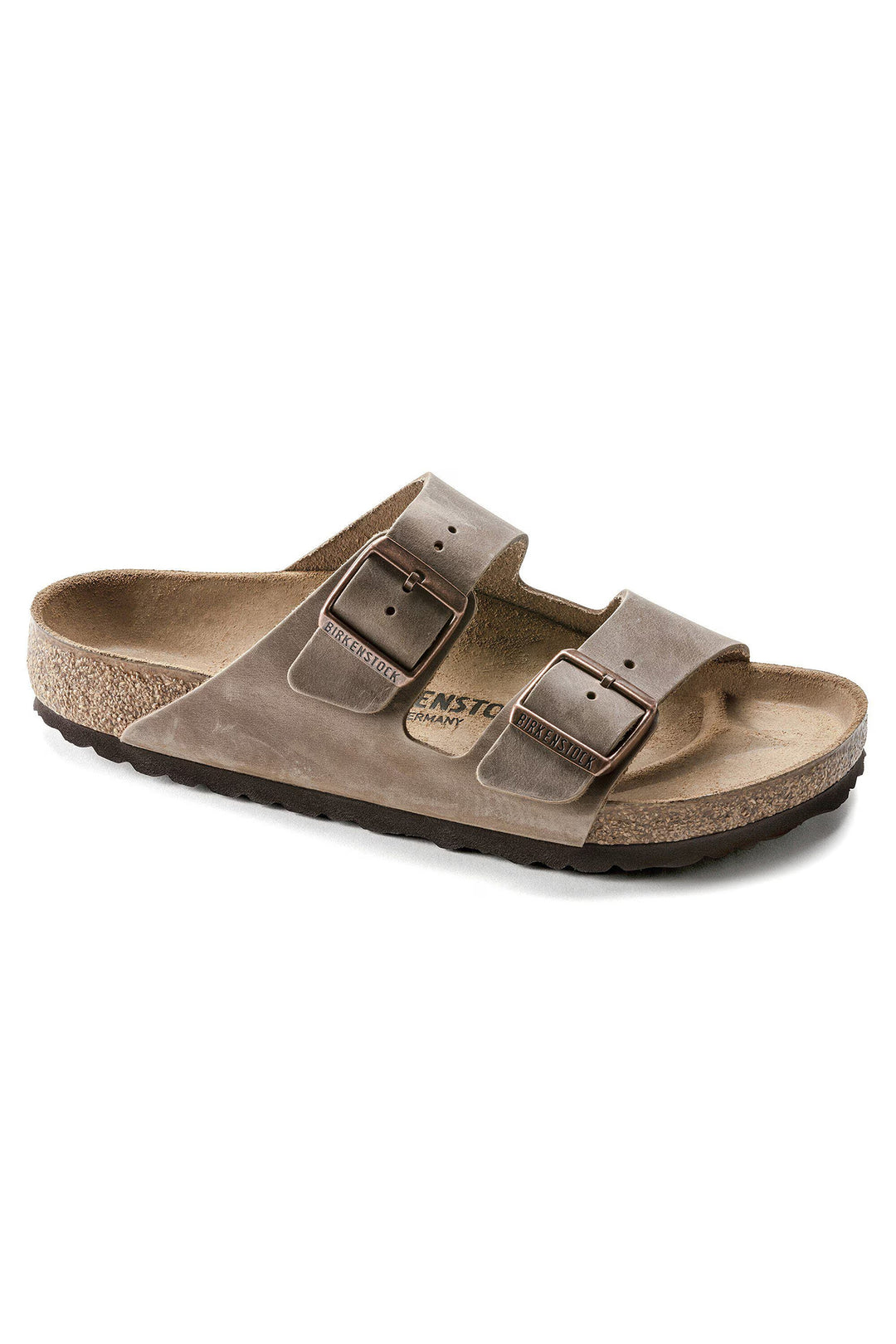Brown sandal with 'Birkenstock' branding on a white background
