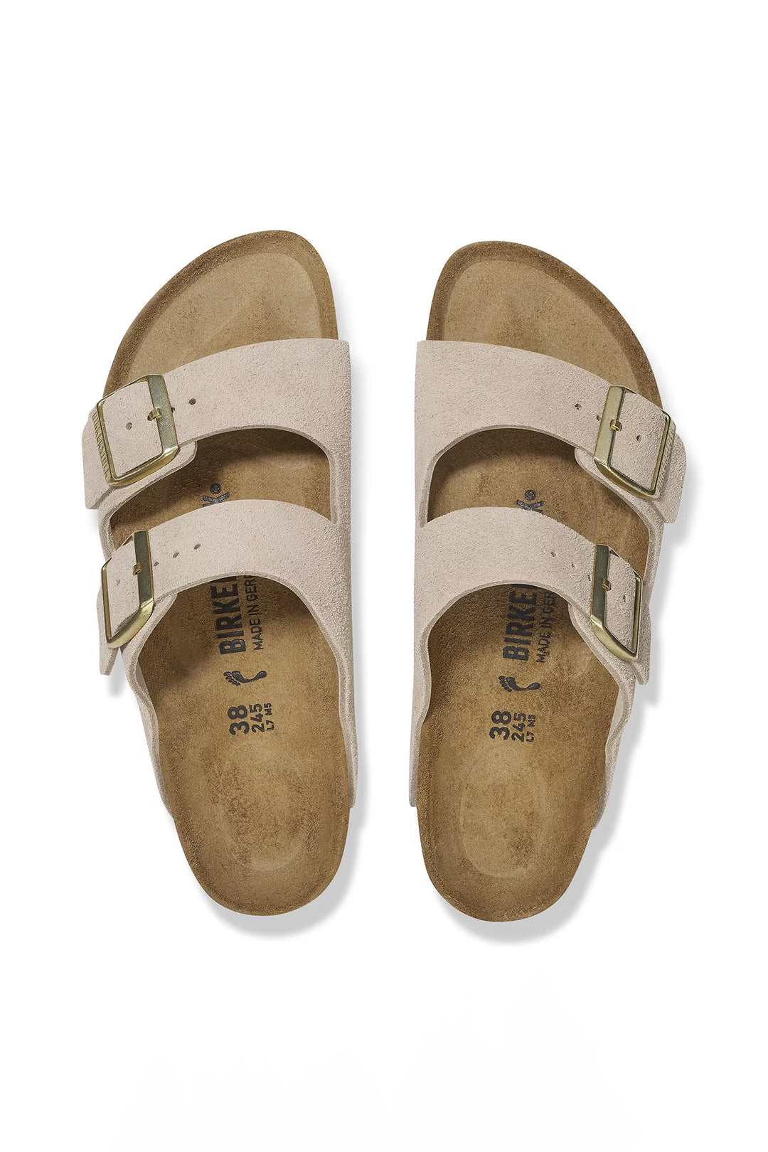 Pair of beige sandals with 'Birkenstock' branding on a white background