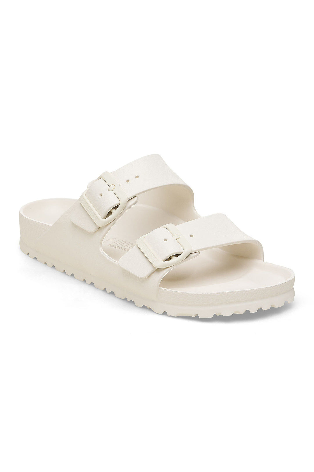 White sandal with two straps on a white background
