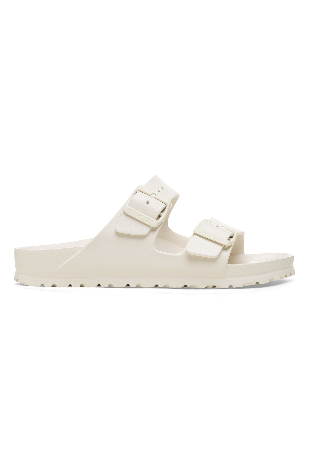 White sandal with double straps on a white background