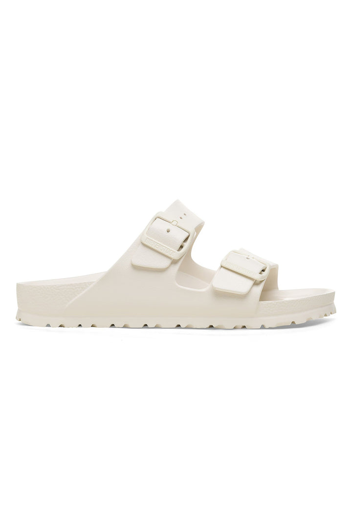White sandal with double straps on a white background