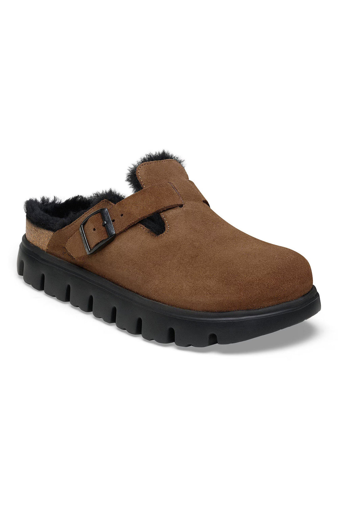 Brown suede clog shoe with black sole and fur lining on a white background