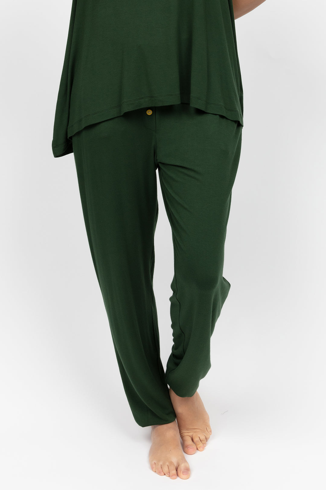 Green pajama set on a white background