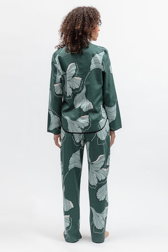 Cyberjammies 5573 Grace Green Floral Print Pyjama Bottoms, full-length front view with the matching top, hands in pockets