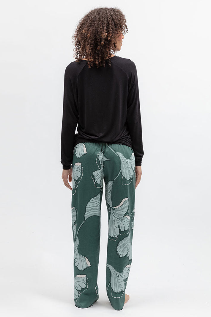 Cyberjammies 5580 Grace Black Slouch Jersey Long Sleeve Pyjama Top, back view with green floral bottoms