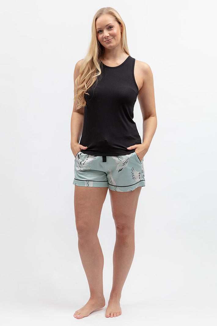 Cyberjammies 5582 Grace Black Jersey Vest, styled with pale shorts