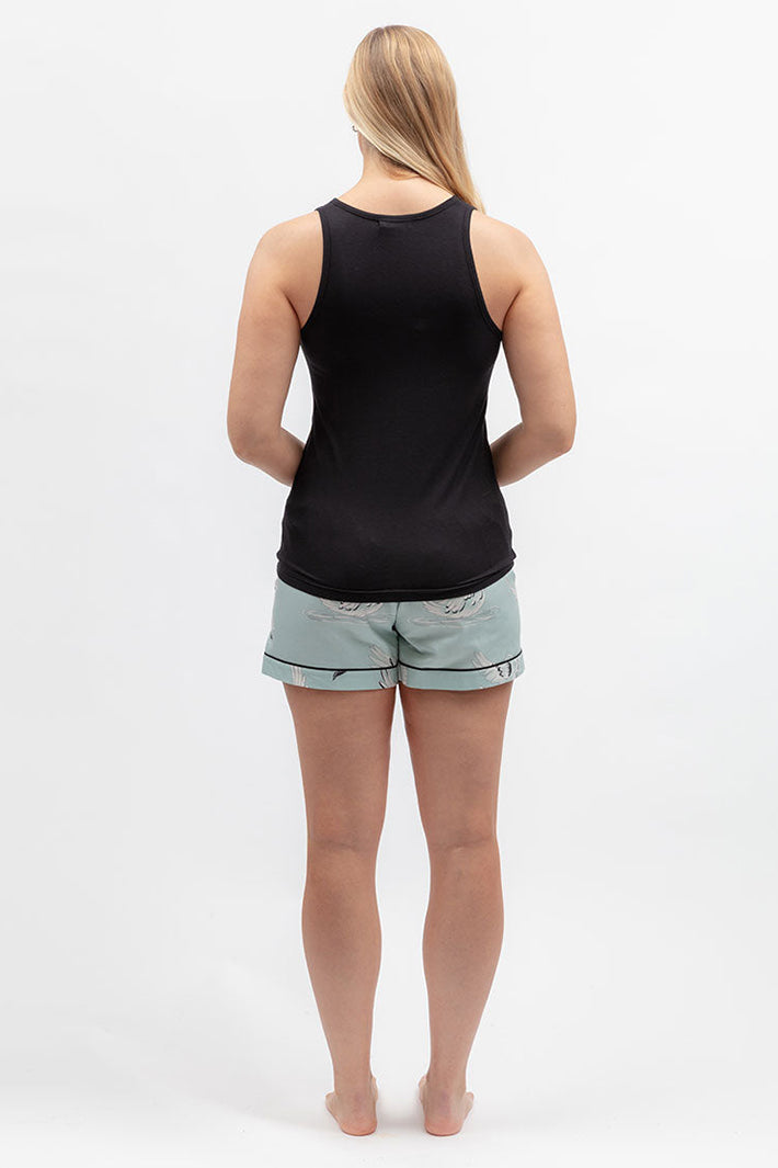 Cyberjammies 5582 Grace Black Jersey Vest, back view with pale shorts