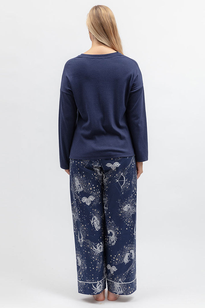 Cyberjammies 5620 Celestial Nights Navy Ribbed Slouch Jersey L/Sleeve Pyjama Top, back view with printed bottoms