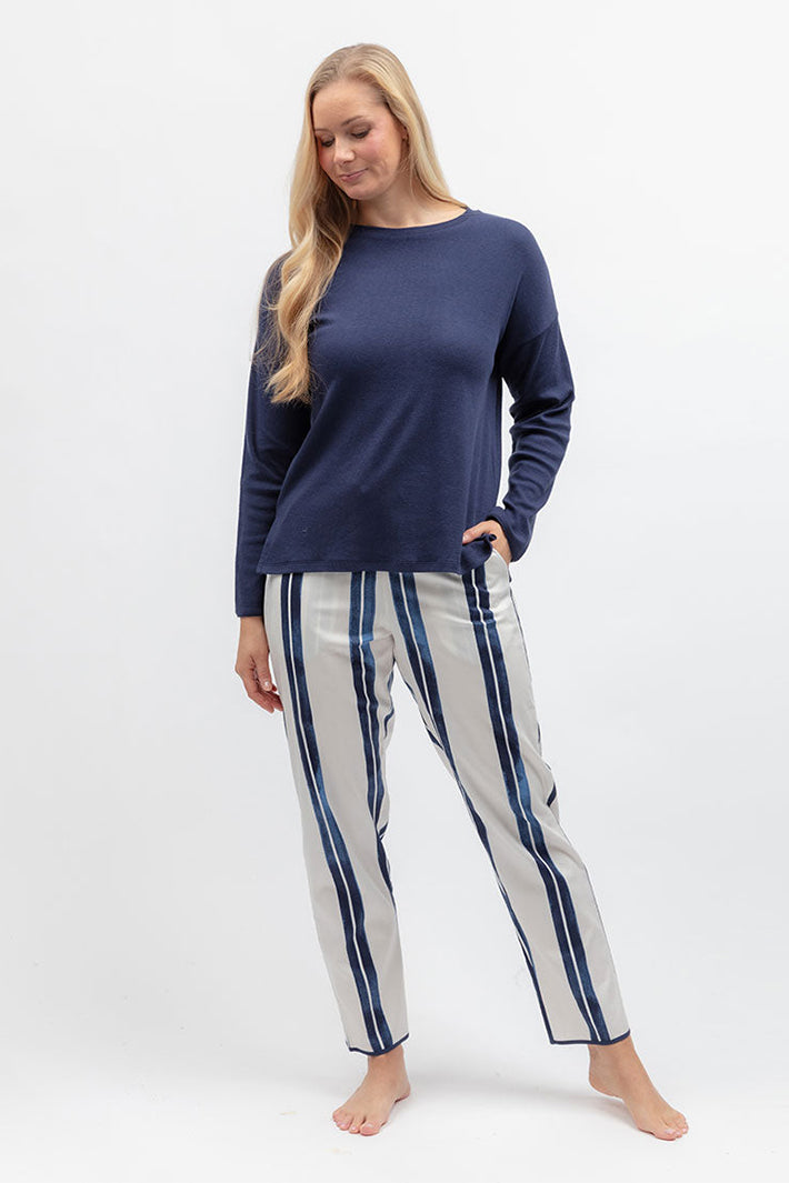 Cyberjammies 5620 Celestial Nights Navy Ribbed Slouch Jersey L/Sleeve Pyjama Top, styled with striped bottoms
