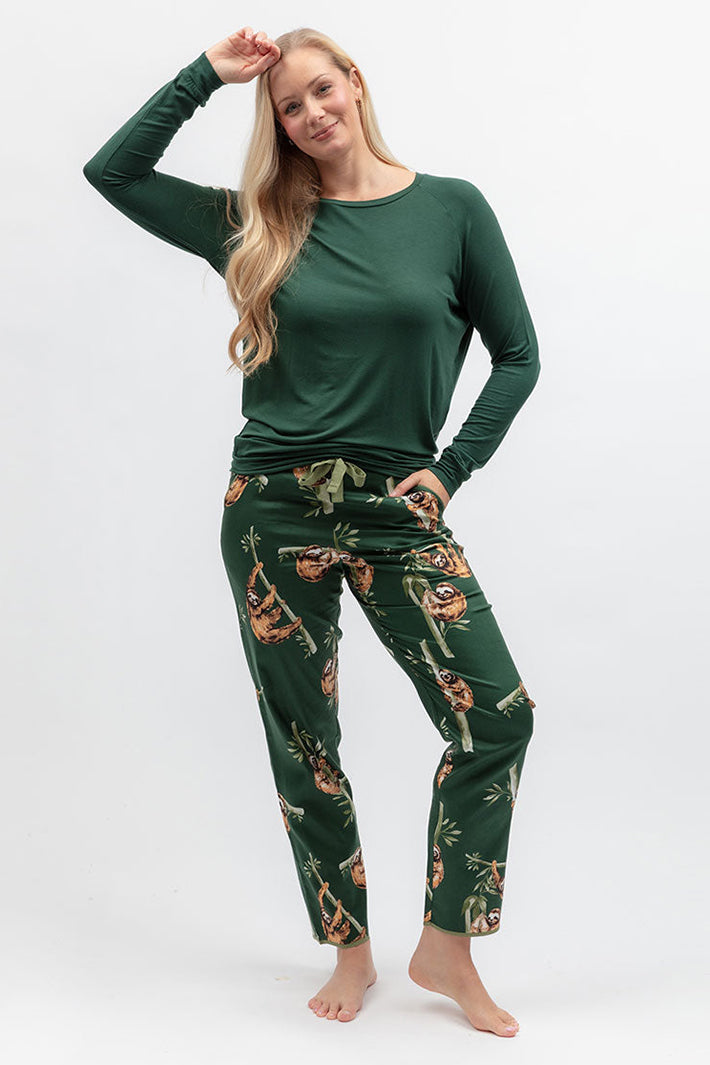 Cyberjammies 5656 Ember Dark Green Slouch Jersey Long Sleeve Pyjama Top, styled with floral bottoms