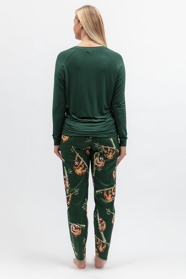 Cyberjammies 5656 Ember Dark Green Slouch Jersey Long Sleeve Pyjama Top, back view with floral bottoms