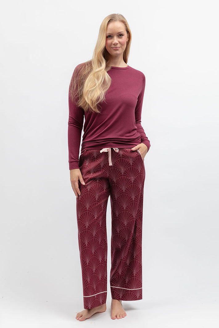 Cyberjammies 5688 Blush Botanica Berry Red Slouch Jersey Long Sleeve Pyjama Top, styled with printed bottoms
