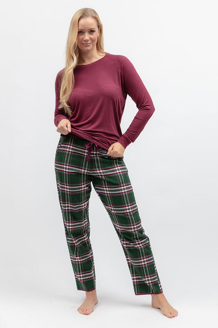 Cyberjammies Enchanted Nutcracker Green Brushed Check Pyjama Bottoms, styled with a berry top