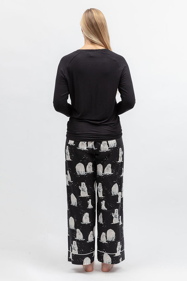 Cyberjammies Polar Drift Polar Bear Print Black Wide Leg Pyjama Bottoms, back view with a black top