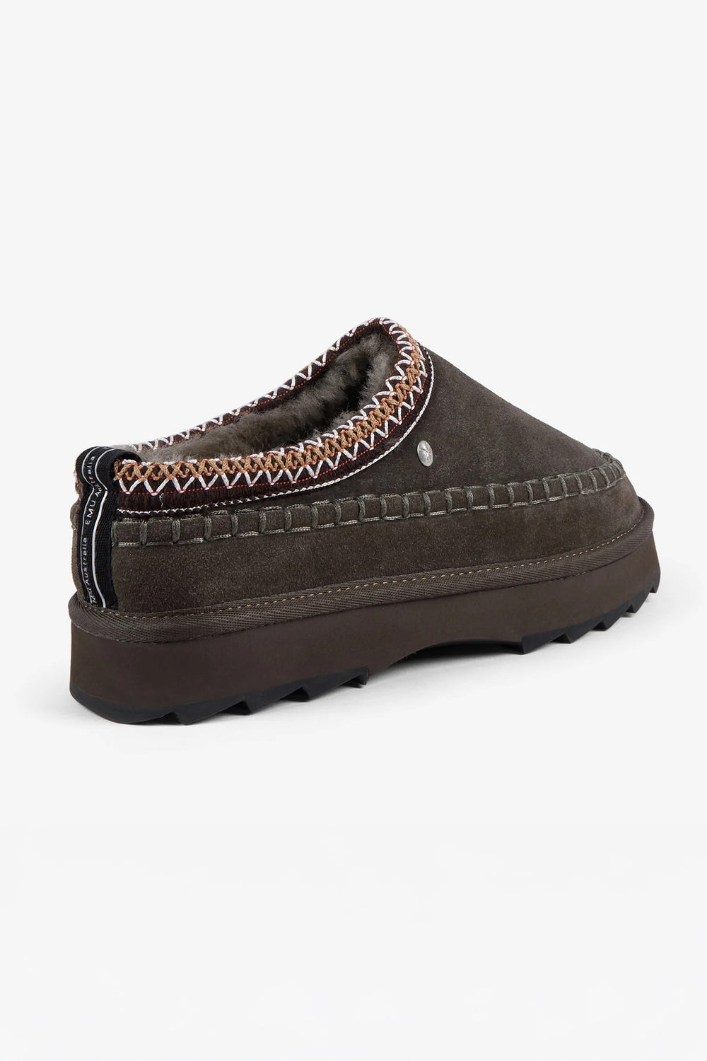 Brown slip-on shoe with patterned trim on a white background