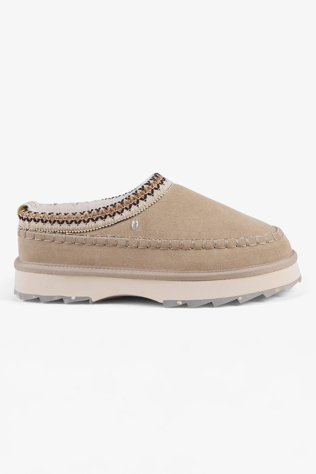 Beige shoe with decorative trim on a white background