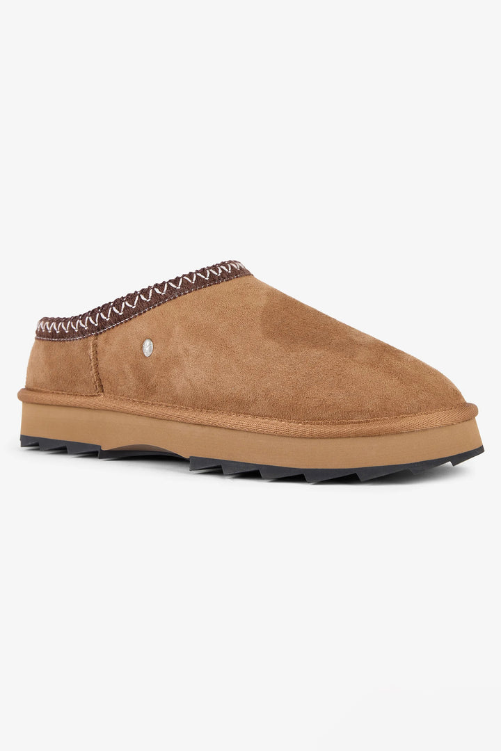 Tan slipper with brown trim on a white background