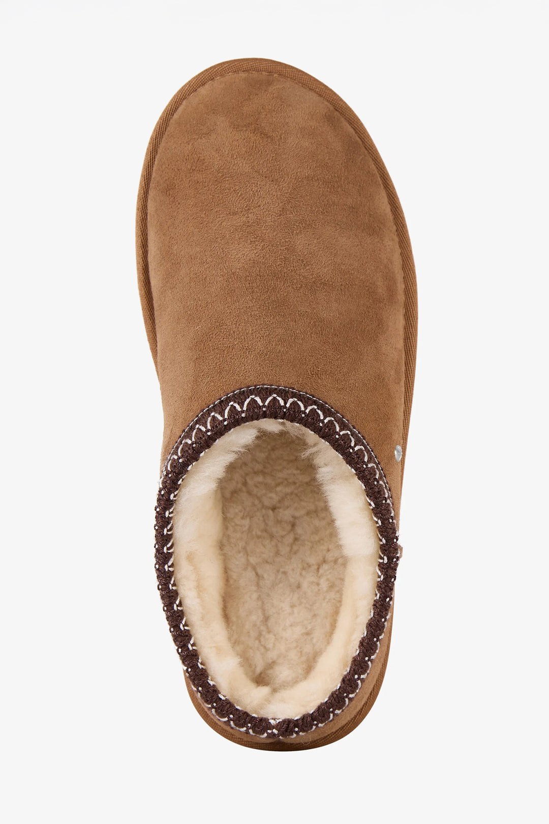 Brown suede slipper with a white interior on a white background