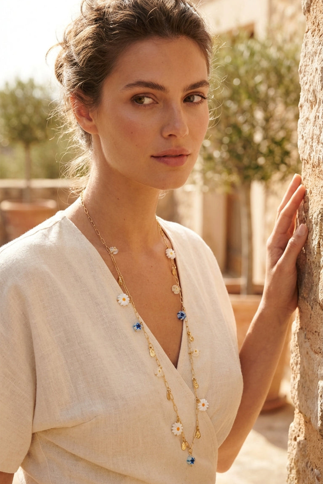 Envy Long Gold Necklace With Blue And White Daisy Detail 4813, worn view