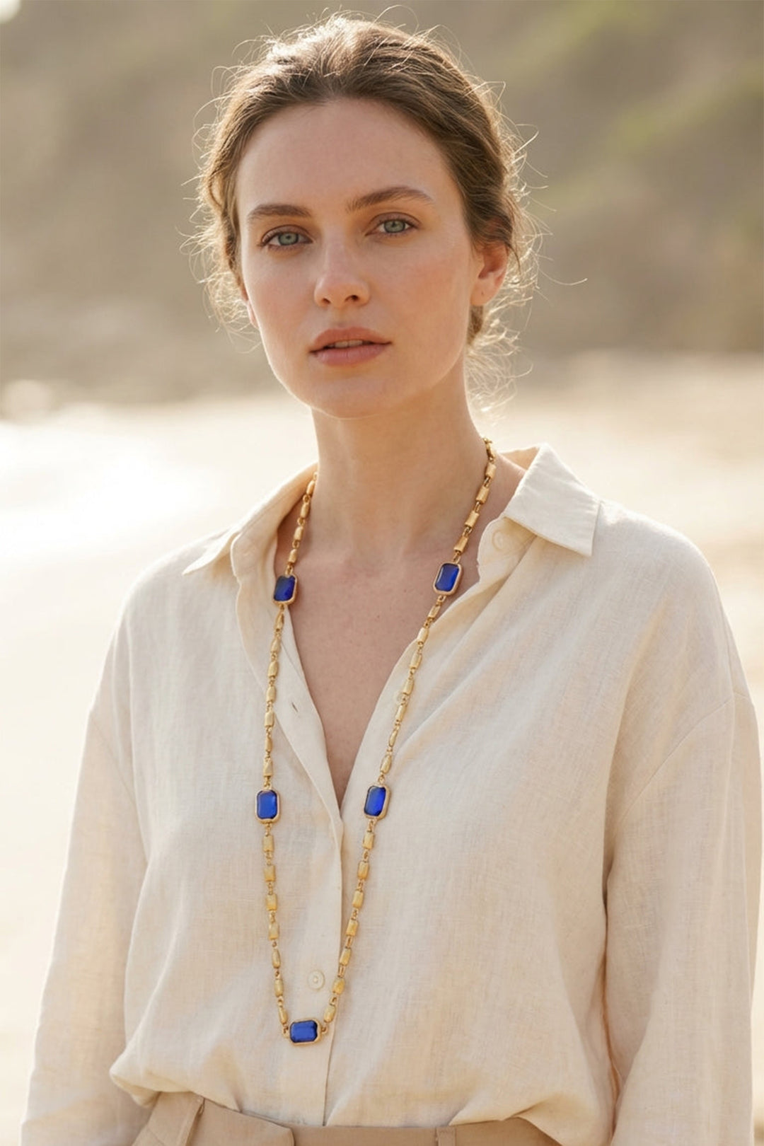 Envy Long Gold Necklace With Faceted Blue Glass Detail 4332, worn view