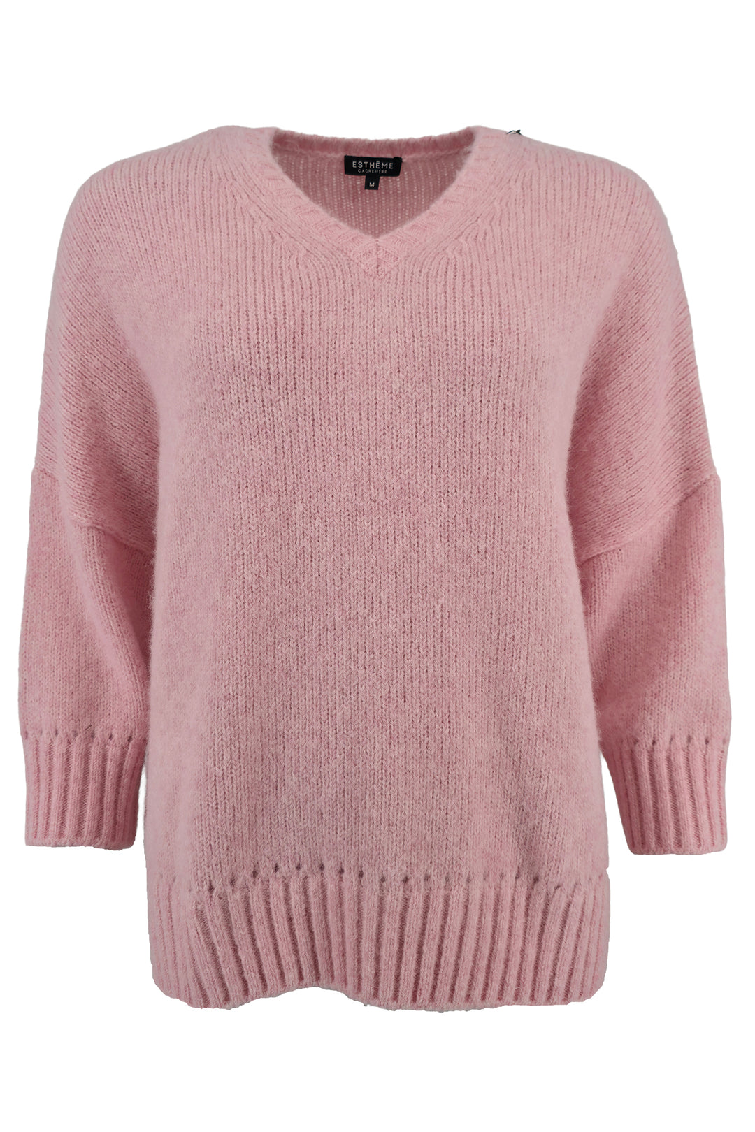 Pink sweater on a white background