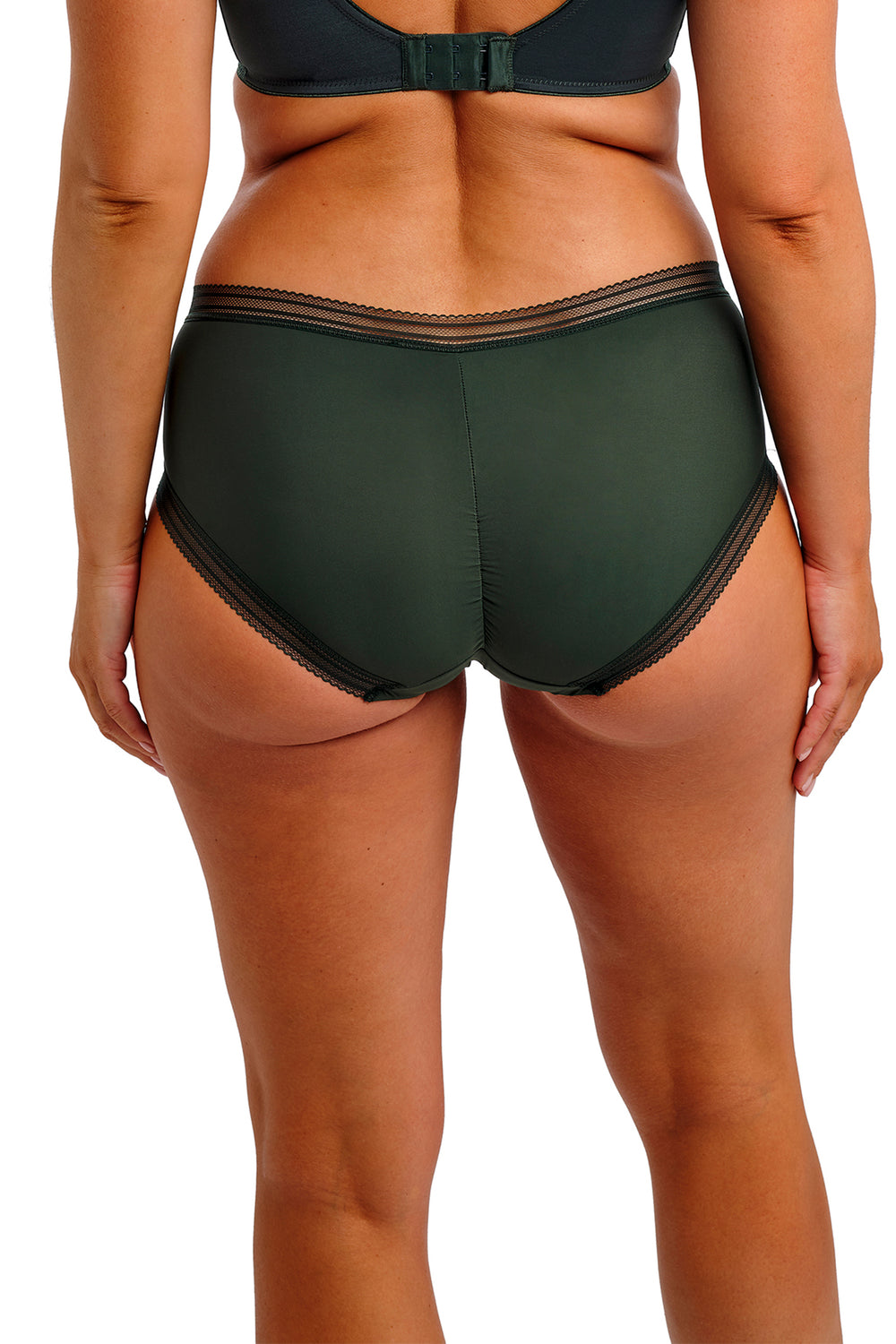 Person wearing a green bikini with a white background