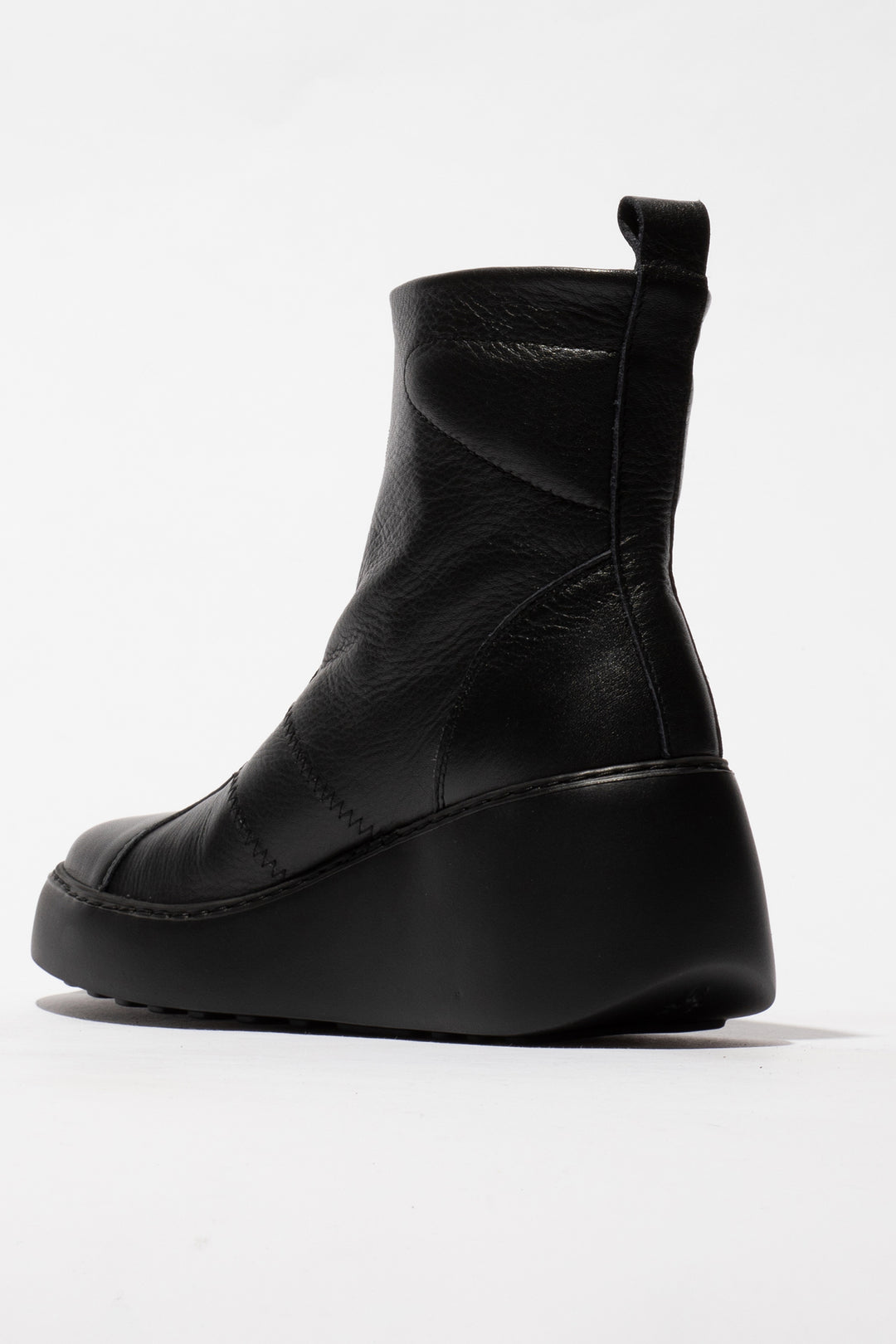 Black leather shoe on a white background