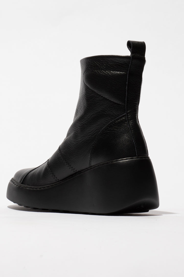 Black leather shoe on a white background