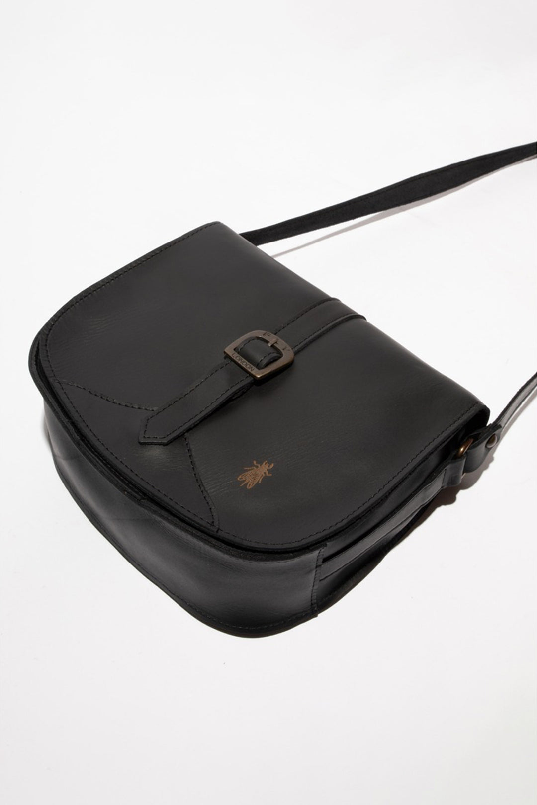 Black leather bag with a buckle on a white background