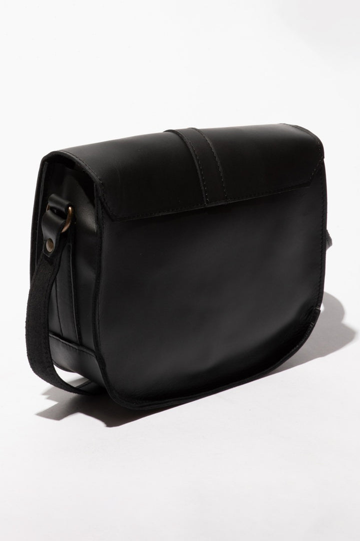 Black leather satchel bag on a white background
