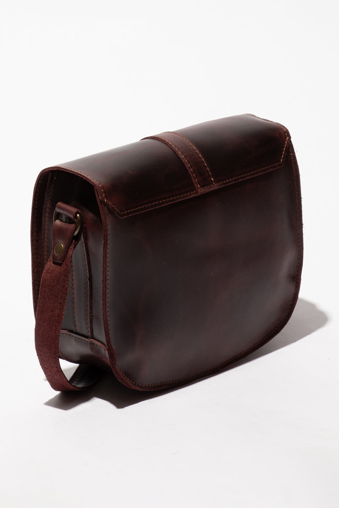 Brown leather satchel bag on a white background