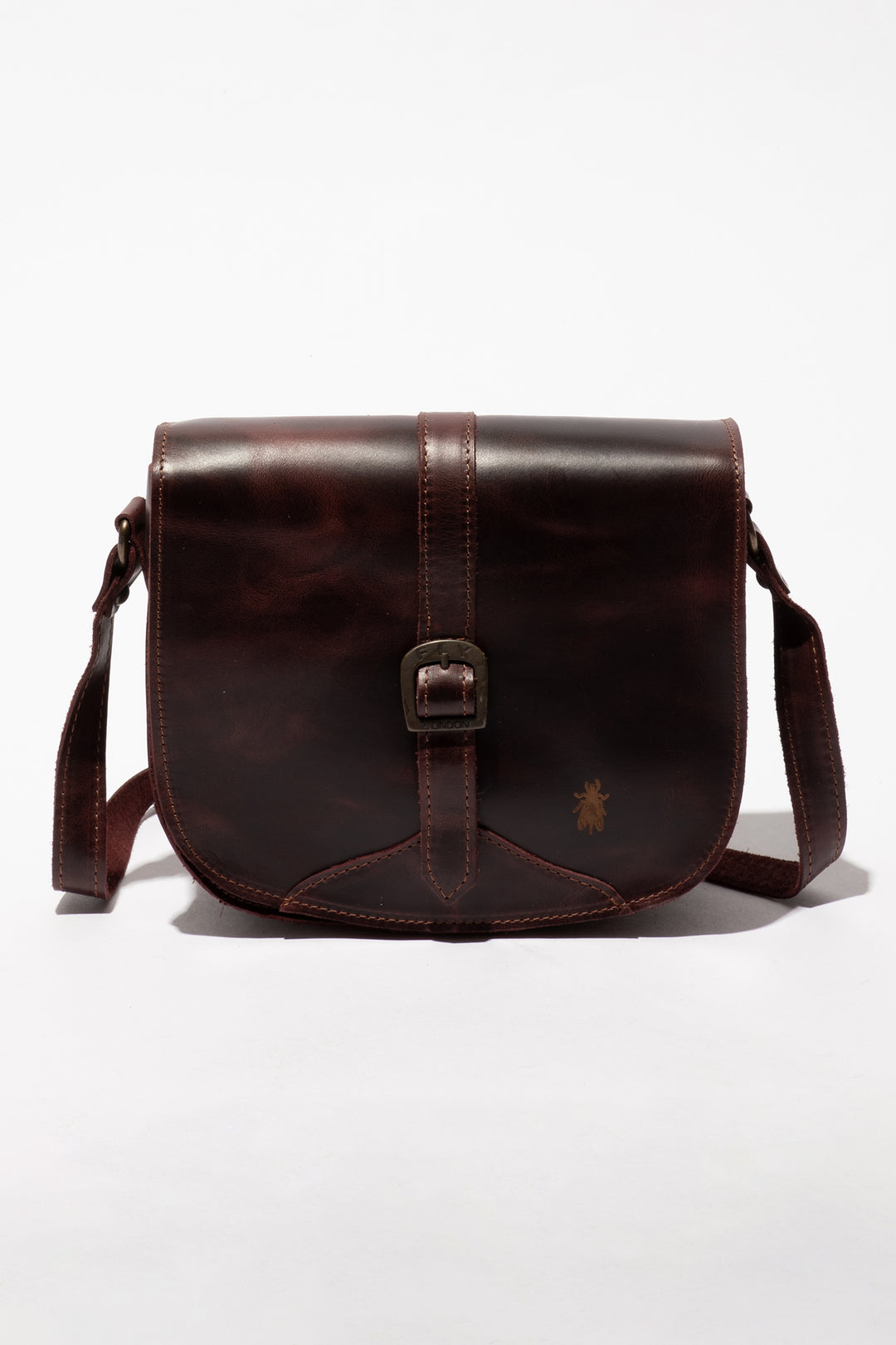 Brown leather bag with a visible brand logo on a white background