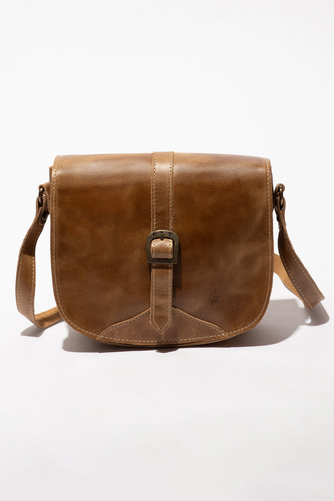 Brown leather satchel bag on a white background