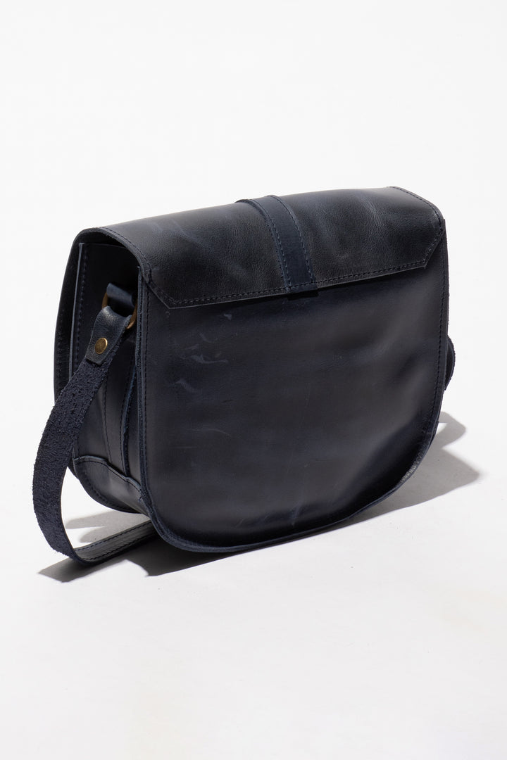 Black leather bag on a white background