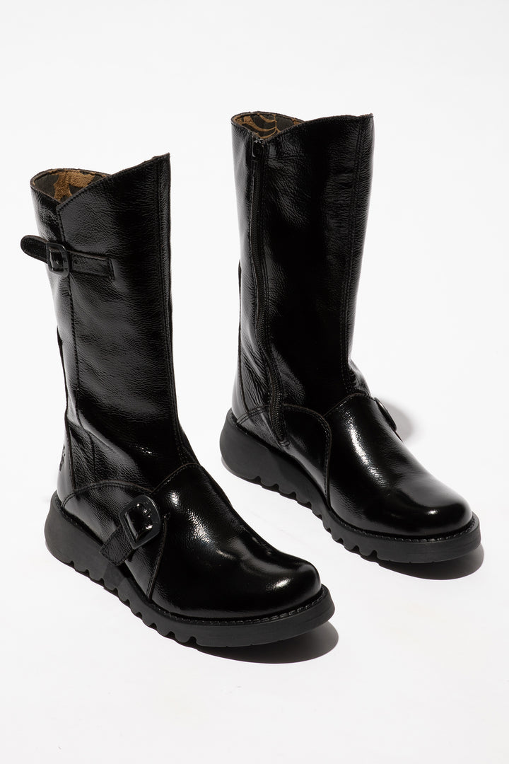 Pair of black leather boots on a white background
