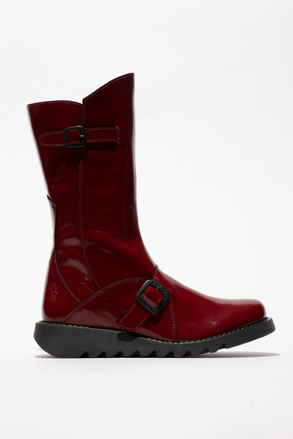 Red boot with a buckle on a white background