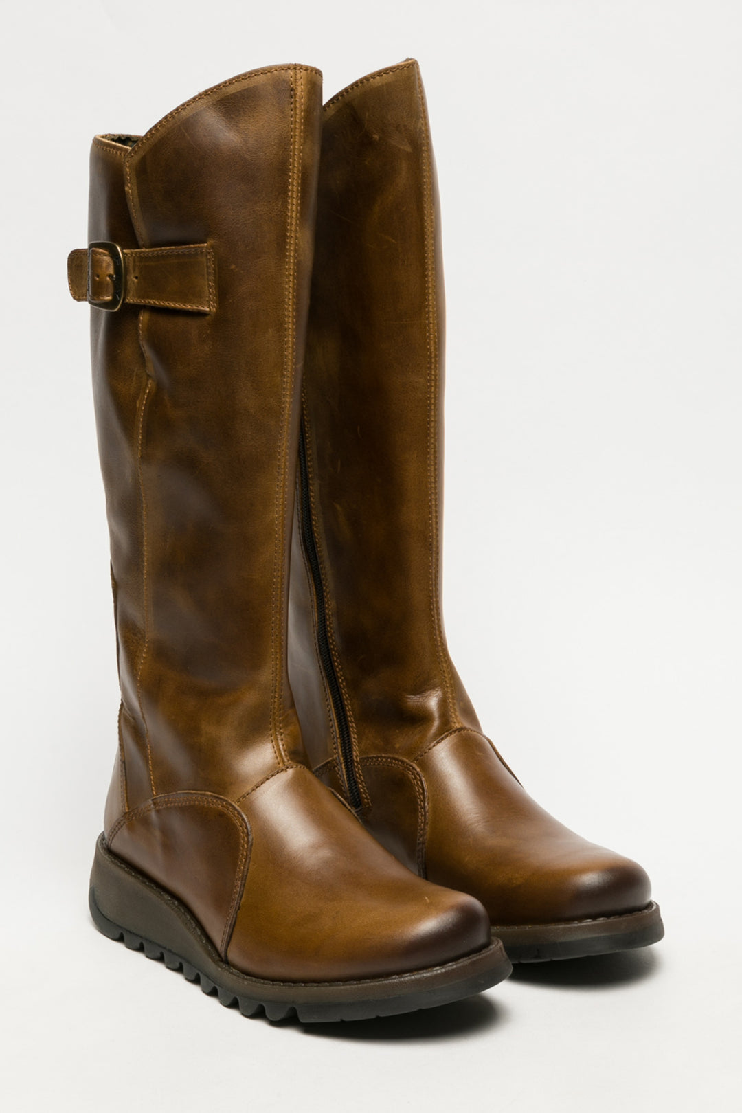 Pair of brown leather knee-high boots on a white background