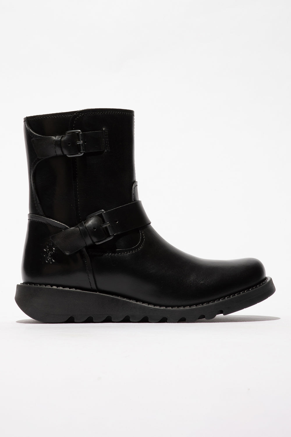 Black boot with buckles on a white background