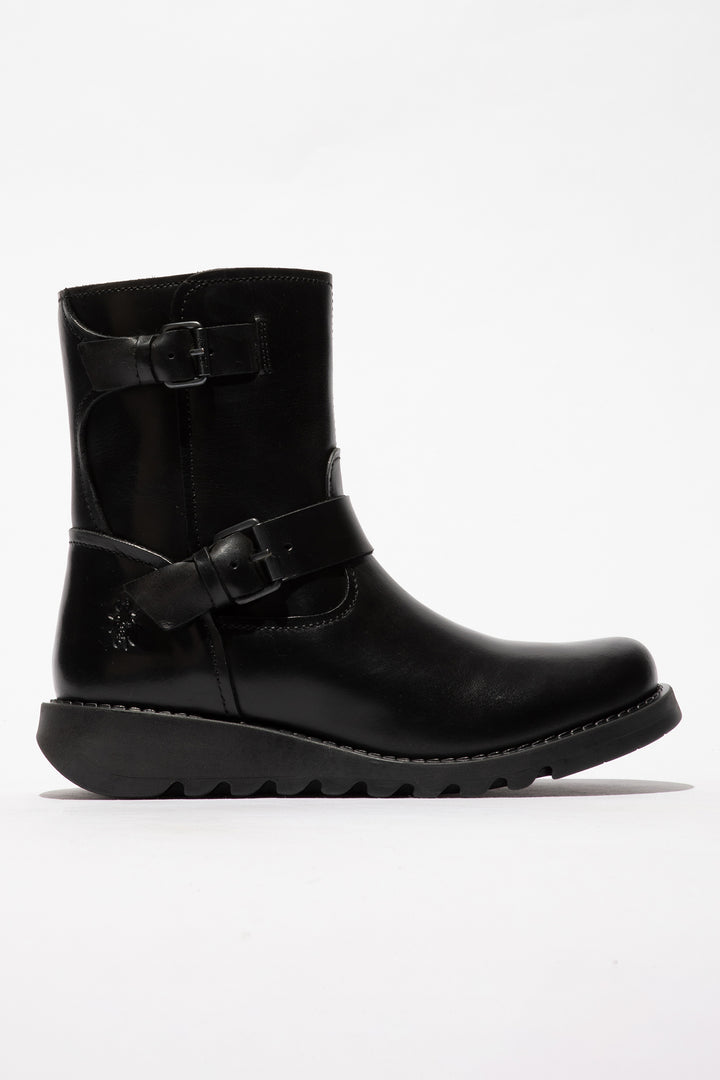 Black boot with buckles on a white background