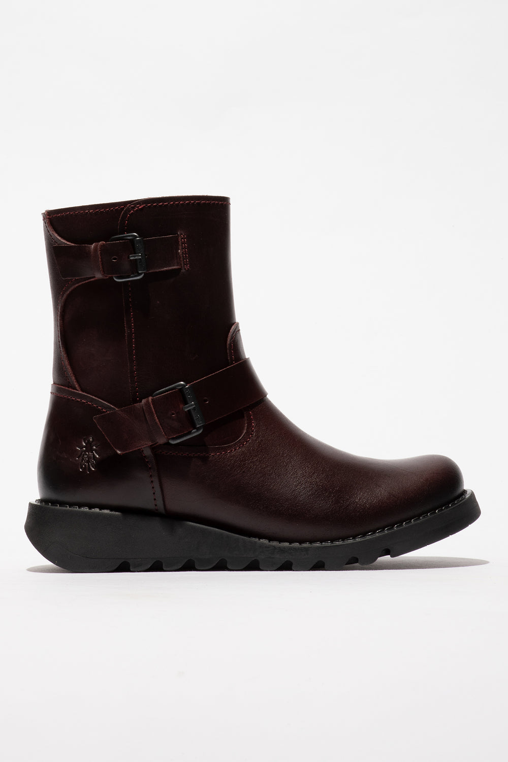 Brown leather boot with buckles on a white background