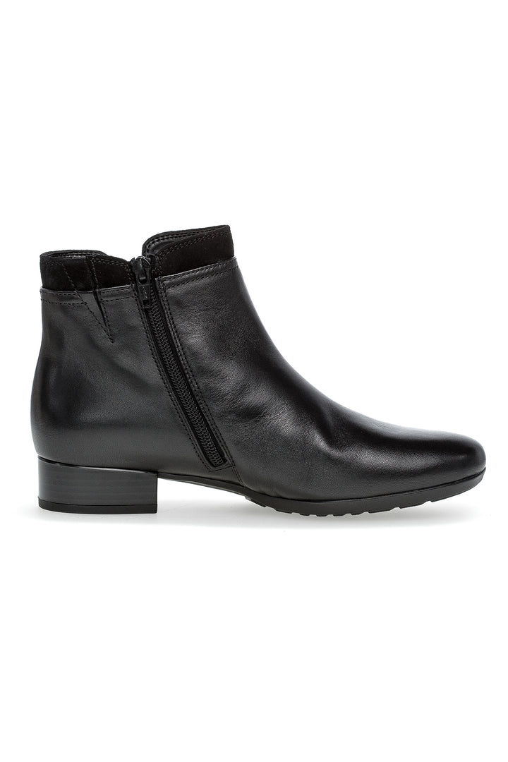 Black ankle boot on a white background